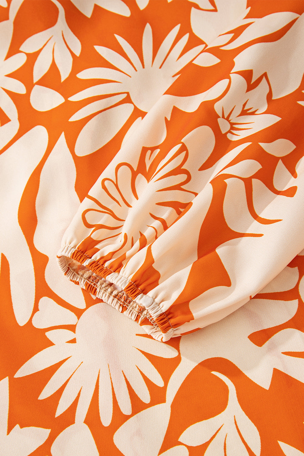 Orange Floral Print Knotted Backless Long Sleeve Blouse