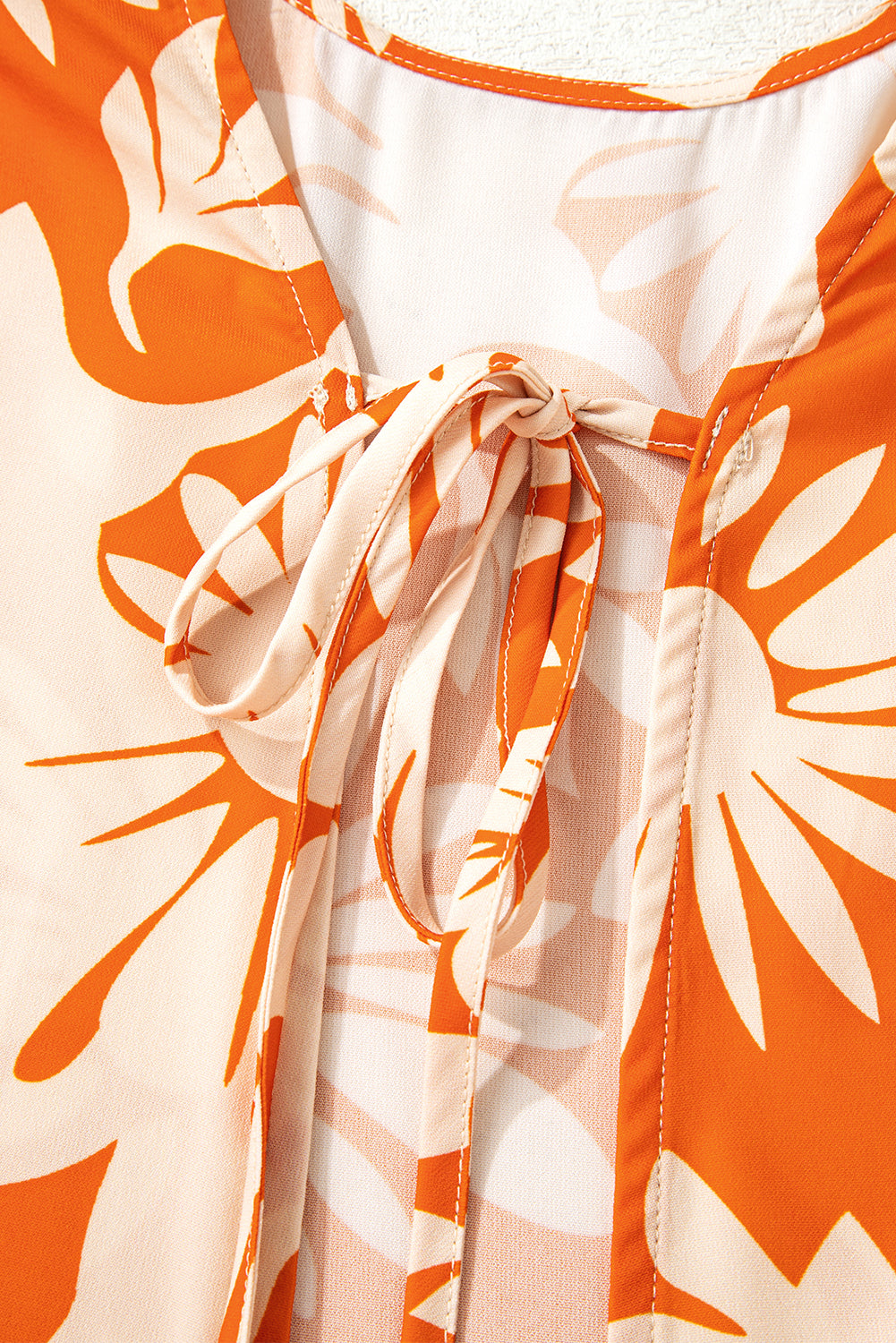 Orange Floral Print Knotted Backless Long Sleeve Blouse